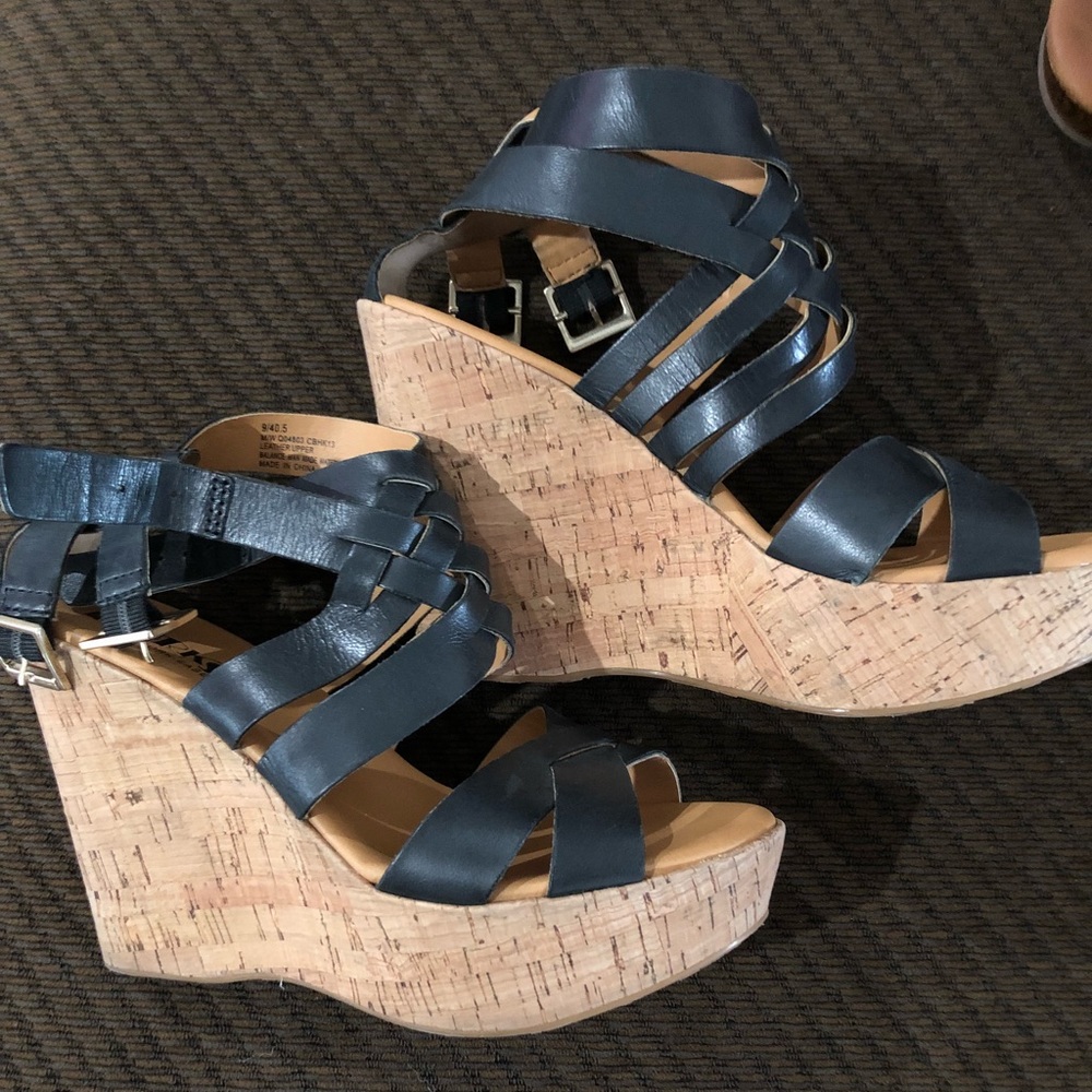 Black wedge heels.